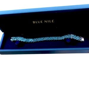 Trio Oval Blue Topaz Bracelet In Sterling Silver (5x3mm) Small Three-Row Tennis